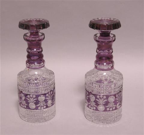 Appraisal: PAIR OF AMETHYST FLASH DECANTERS Each with flat star-cut stopper