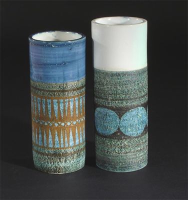 Appraisal: Two Troika Pottery Cylinder vases painted in colours printed and