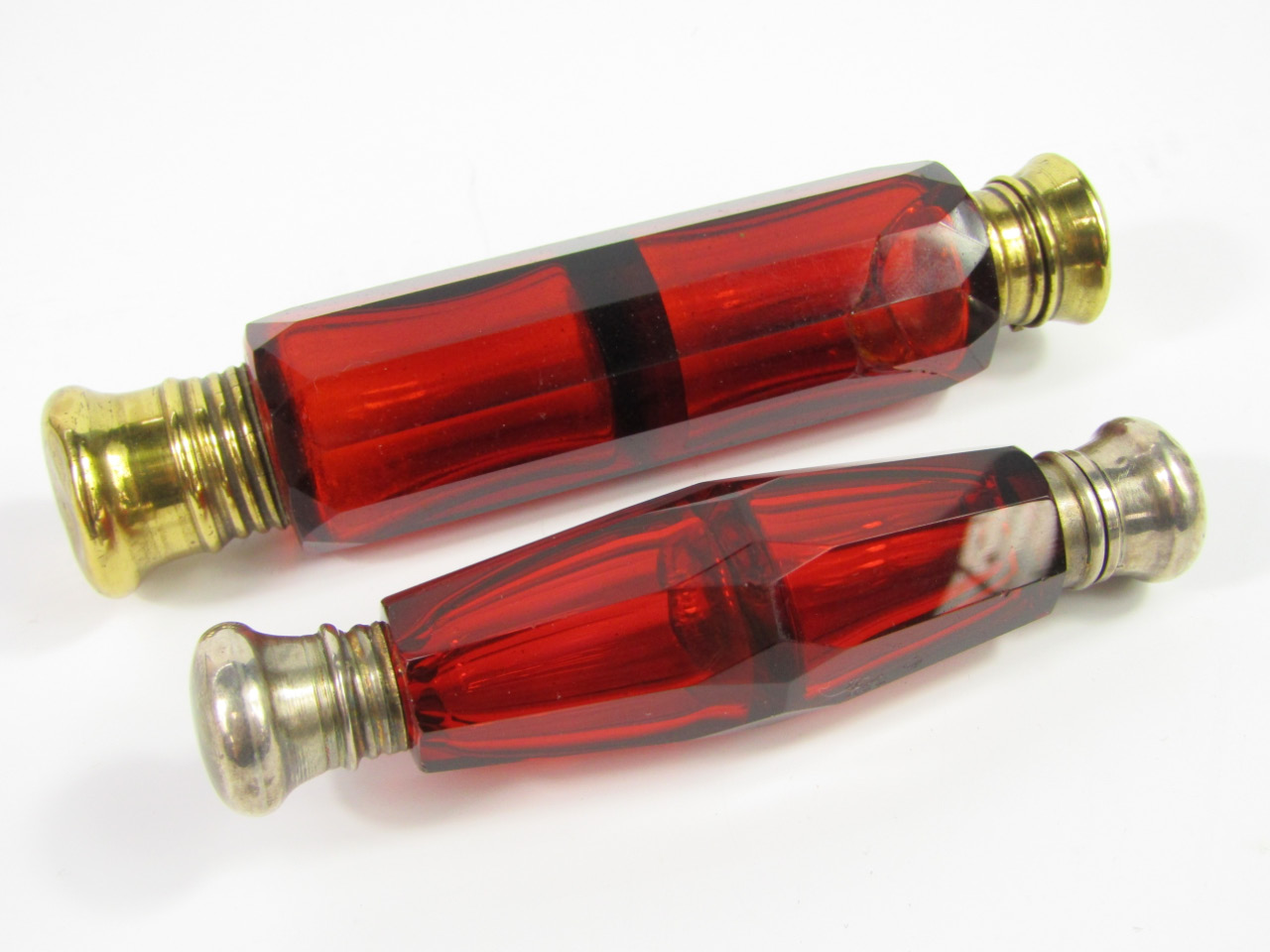 Appraisal: A Victorian cranberry glass double ended scent and smelling salts