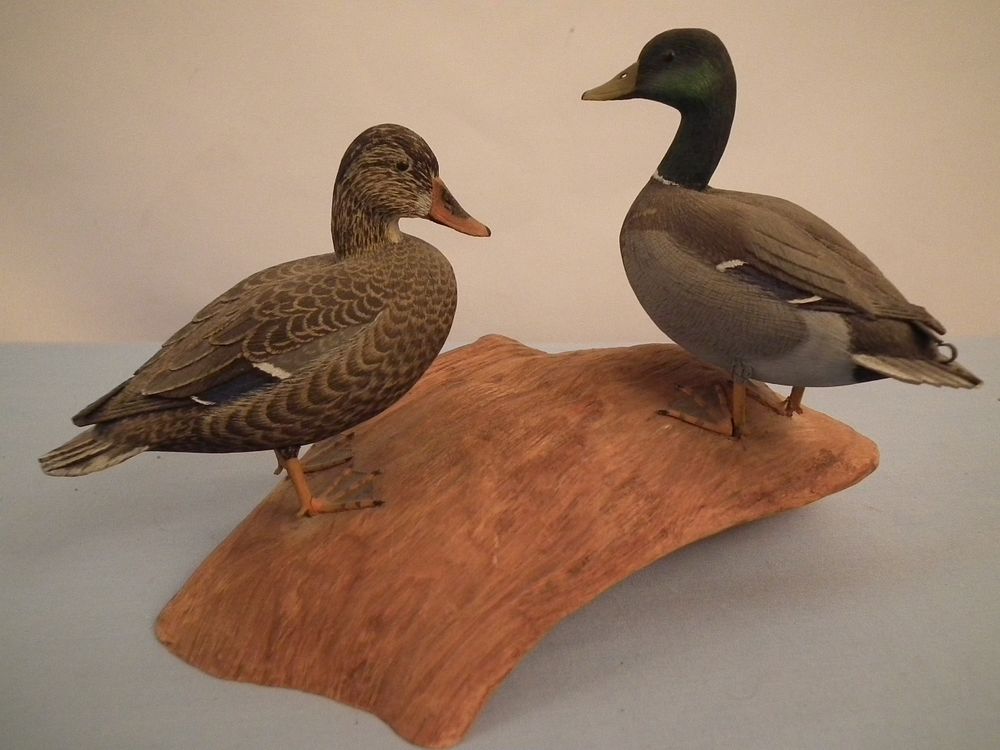 Appraisal: CHARLES BERRY DUCK CARVINGS Pair of finely carved and painted