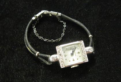 Appraisal: Lady's platinum and diamond wristwatch ConcordSquare case silver toned face