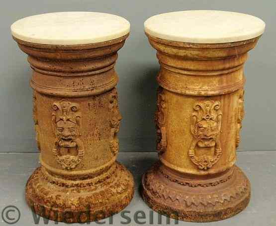 Appraisal: Pair of Victorian cast iron plant stands with marble tops