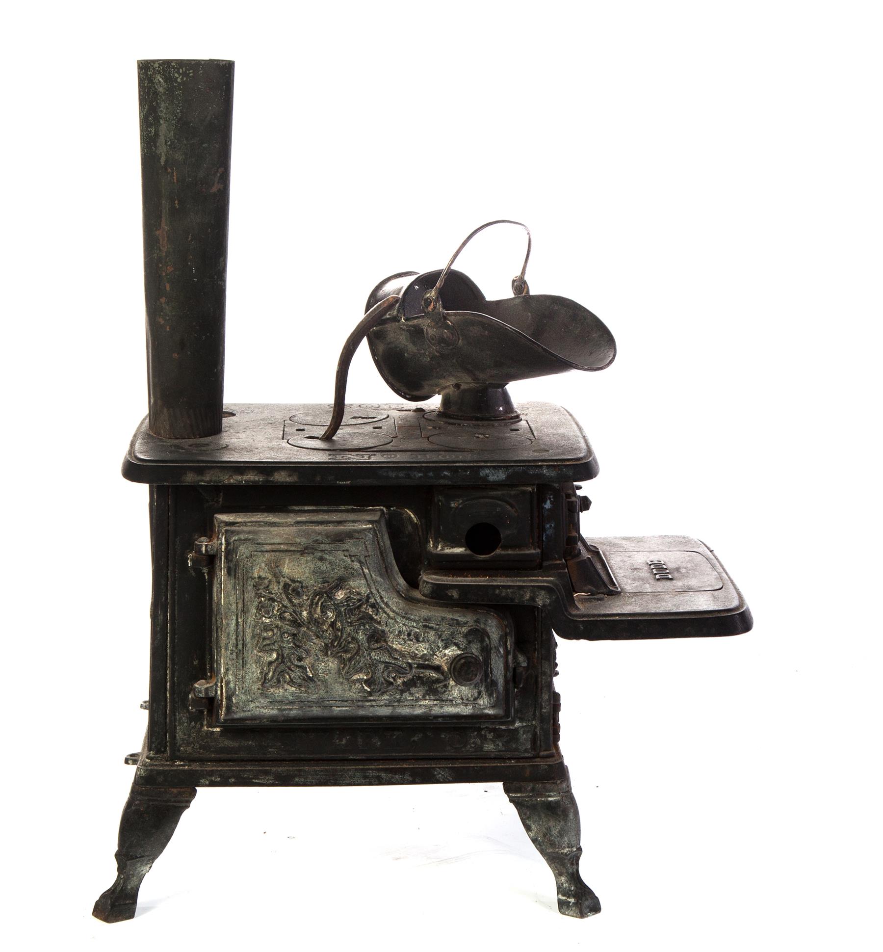 Appraisal: CHILD SIZE CAST IRON STOVE BY CENTRAL CITY STOVE CO