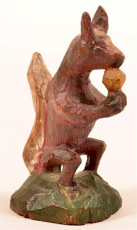 Appraisal: Wilhelm Schimmel Carved Squirrel Eating a Nut Wilhelm Schimmel Cumberland