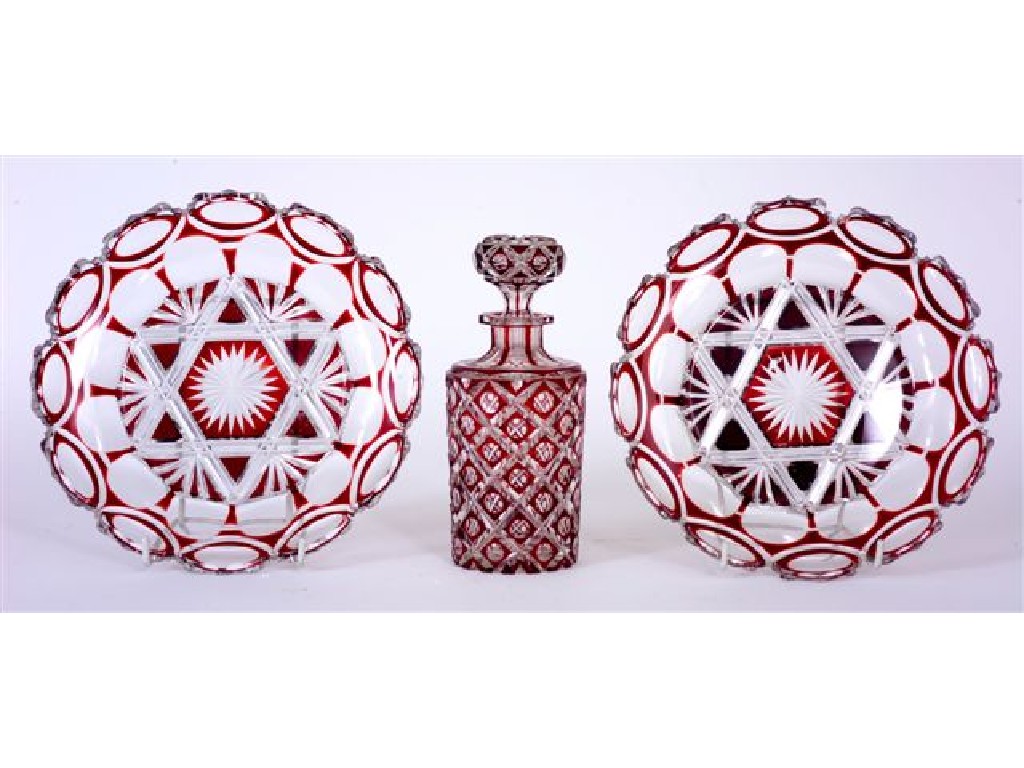 Appraisal: BOHEMIAN RUBY CASED GLASS DECANTER with elaborate diamond cutting together