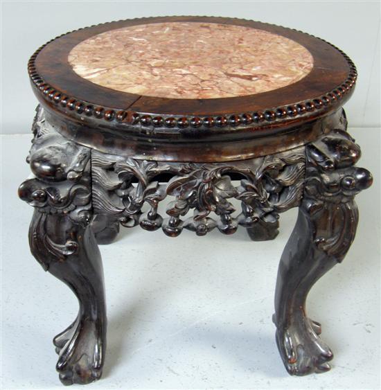 Appraisal: Chinese hardwood circular stand with carved decoration and inset marble