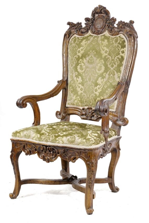 Appraisal: AN ARMCHAIR Baroque Veneto circa Molded and carved walnut Green