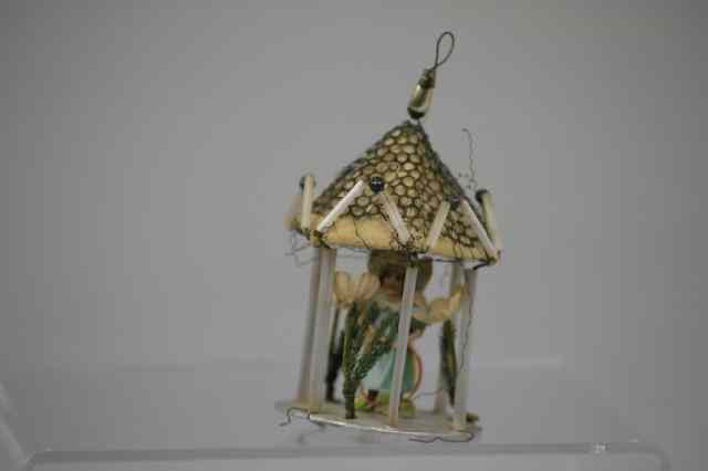 Appraisal: TWO CHILDREN IN GAZEBO ORNAMENT Early German Sebnitz gazebo with