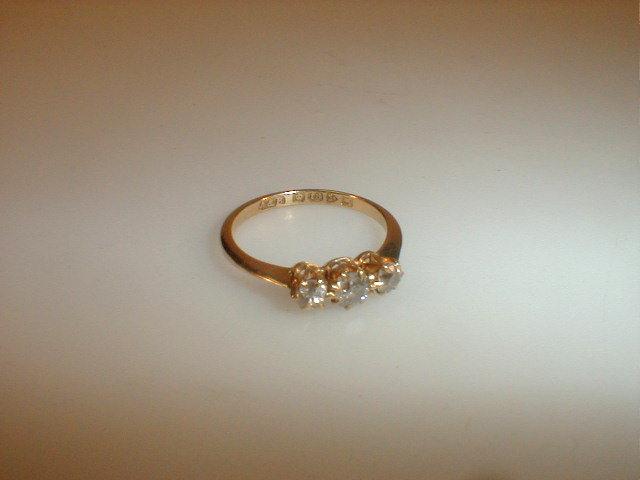 Appraisal: A three stone diamond ring approx ct set in ct