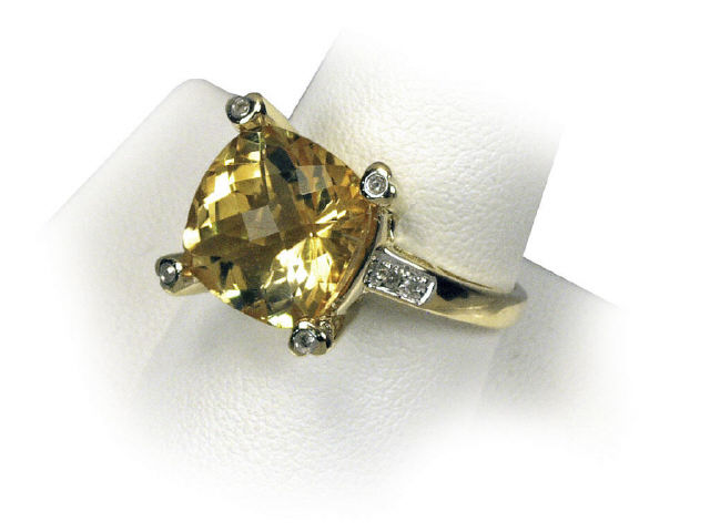 Appraisal: Vibrant K yellow gold lady's ring set with a center