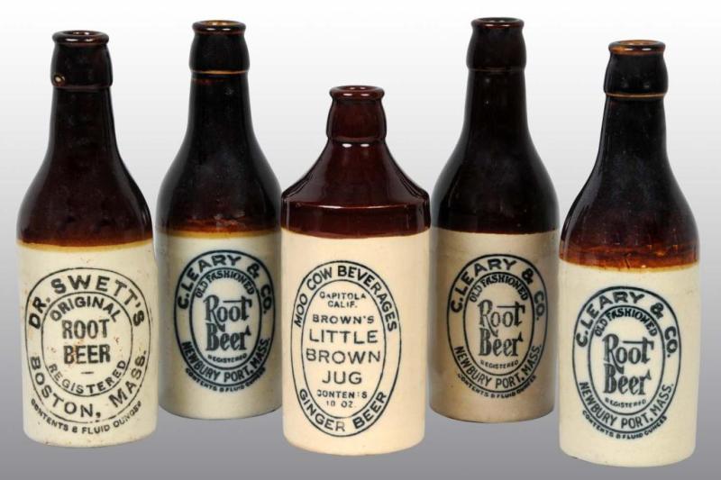 Appraisal: Lot of Stoneware Root Beer Bottles Description Includes three for