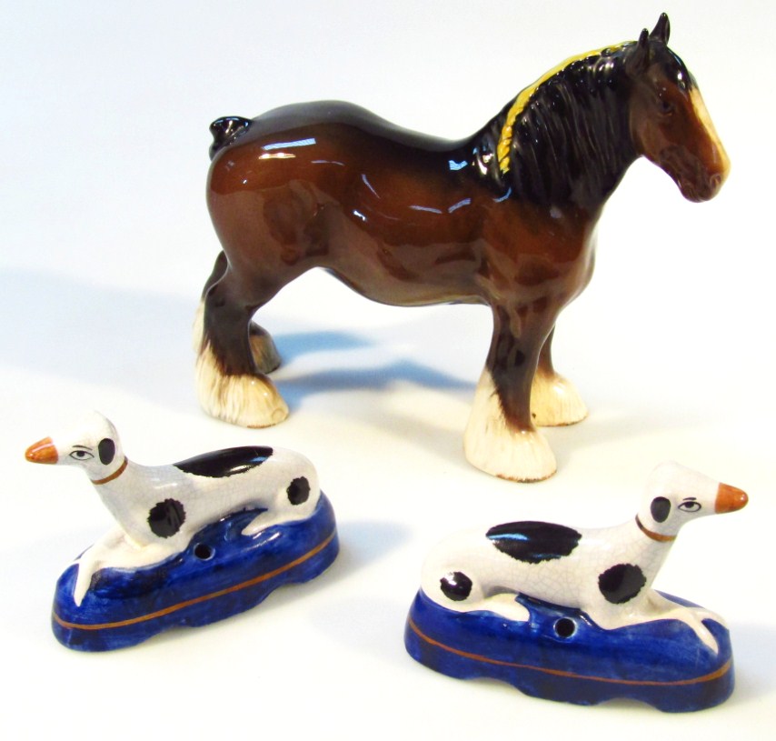 Appraisal: A Beswick brown shirehorse and a pair of modern Staffordshire