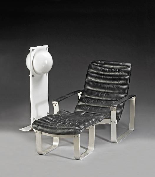 Appraisal: An Asko aluminum and leather lounge chair and matching ottoman