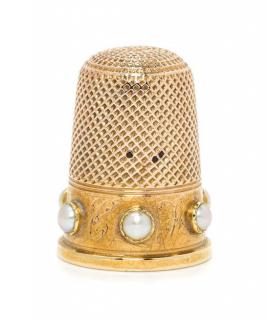 Appraisal: A Yellow Gold and Pearl Inset Thimble the knurled top