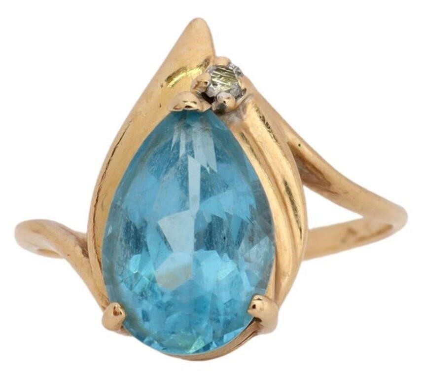 Appraisal: Estate kt yellow gold ring pear cut light blue gemstone