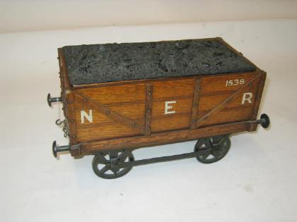 Appraisal: A VICTORIAN CIGAR BOX modelled as a North Eastern Railways