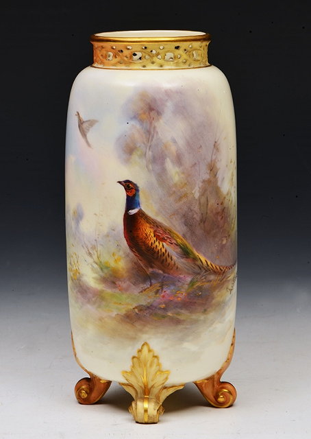 Appraisal: A ROYAL WORCESTER VASE of cylindrical form with pierced rim