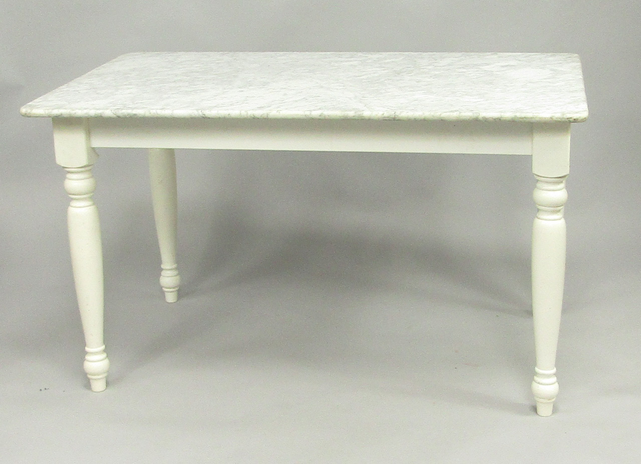 Appraisal: A white painted wooden kitchen table with a marble top