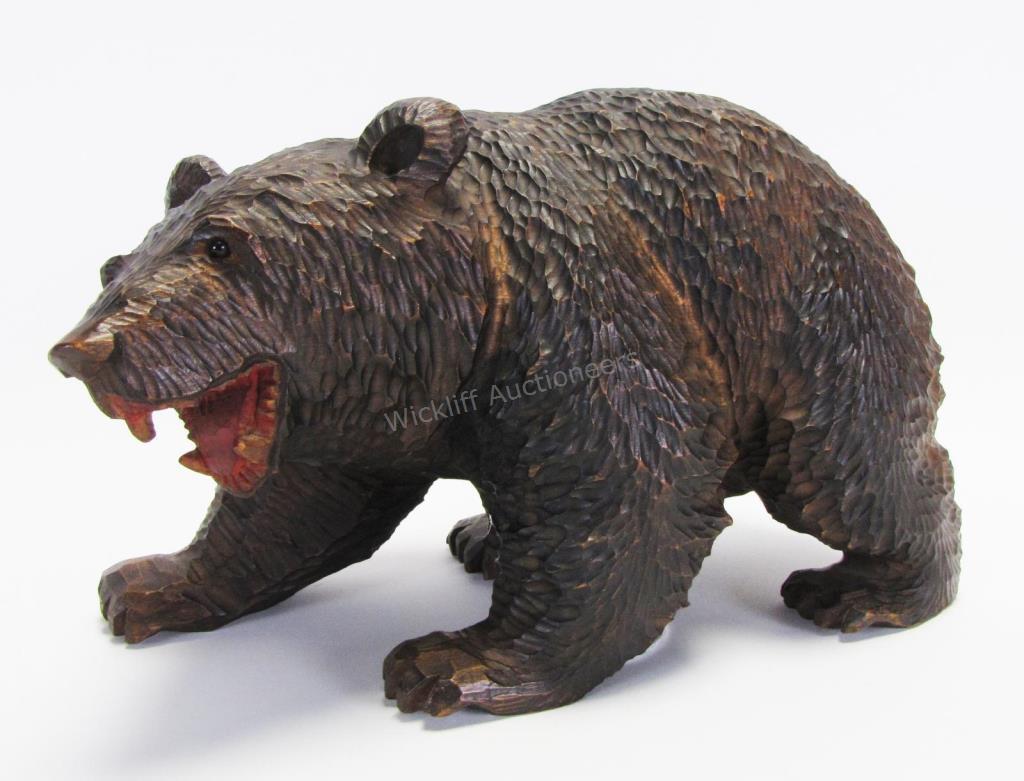 Appraisal: Wood Carved Bear Sculpture depicting a bear on all four