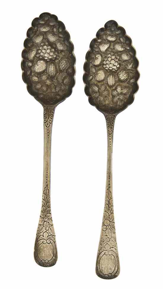 Appraisal: Two English Silver Berry Spoons London comprising a Thomas Wallis