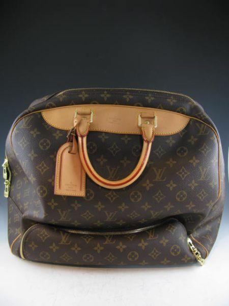 Appraisal: Louis Vuitton Monogram Evasion Bag numbered VI carry-on size with