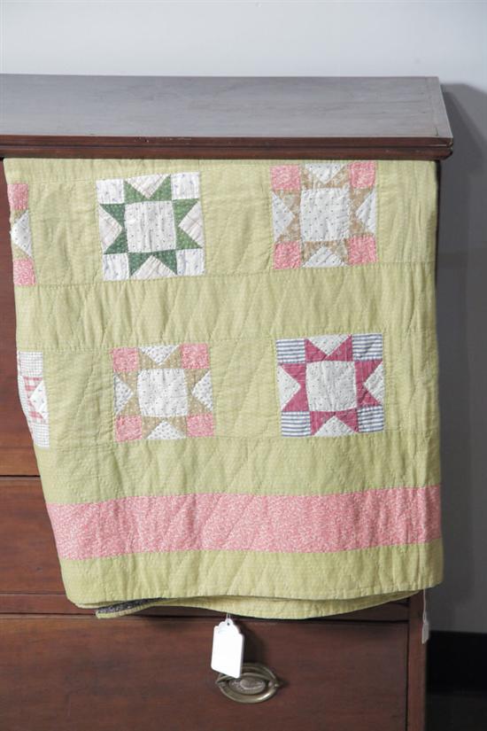 Appraisal: QUILT WITH STARBURST BLOCKS Polychrome cotton quilt having blocks with