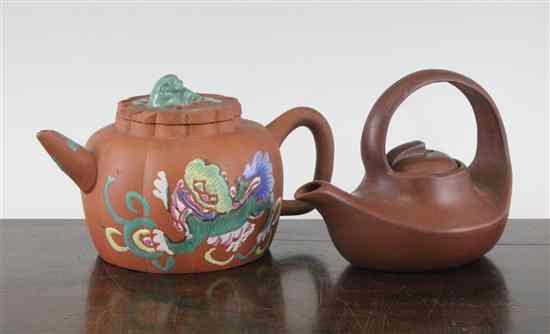 Appraisal: A Chinese Yixing enamelled stoneware teapot decorated with a Buddhist