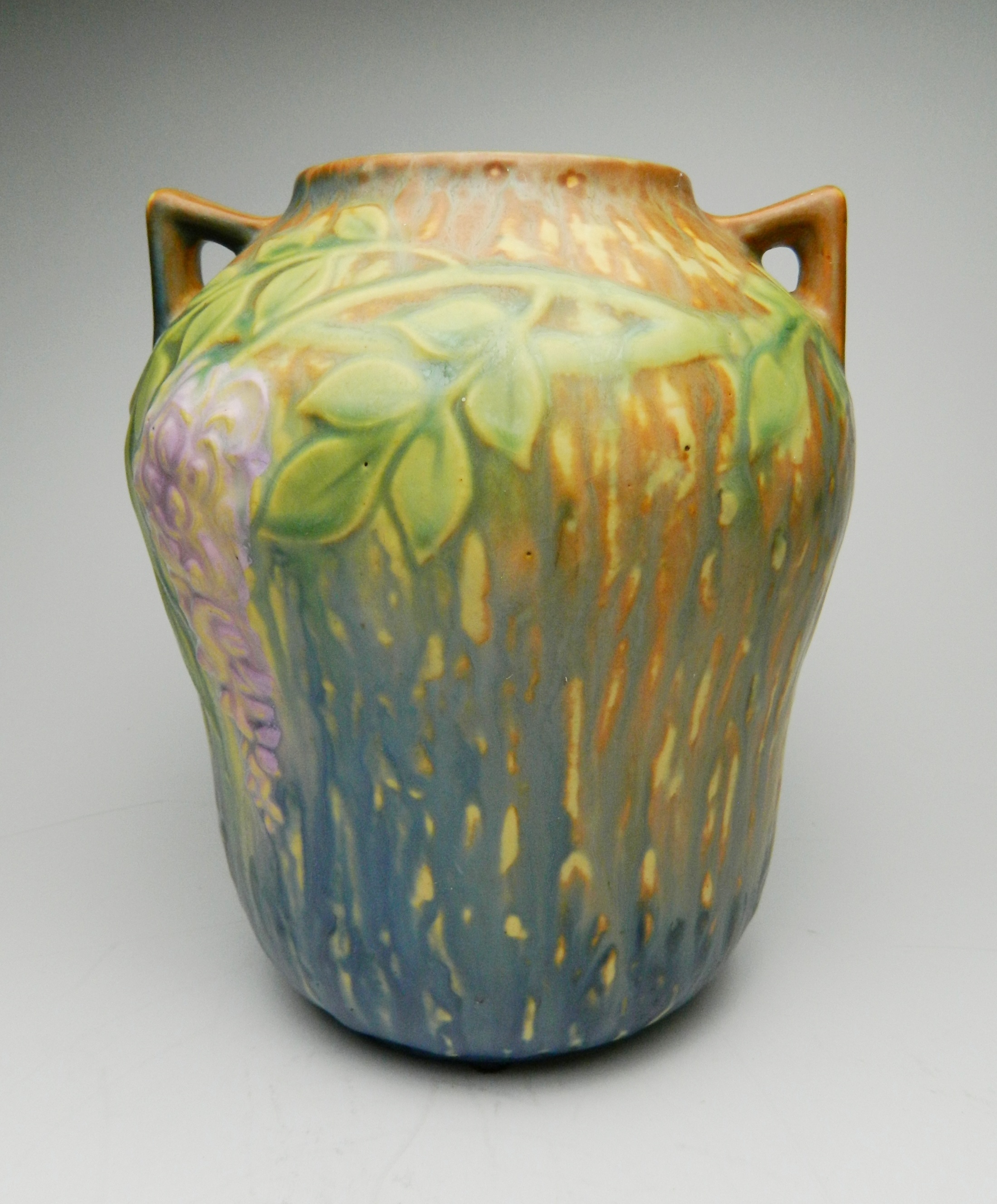 Appraisal: Roseville pottery Wisteria vase ca pattern design by Frank Ferrell