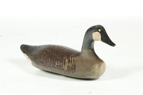 Appraisal: CANADA GOOSE DECOY American early th century hardwood Carved life-size