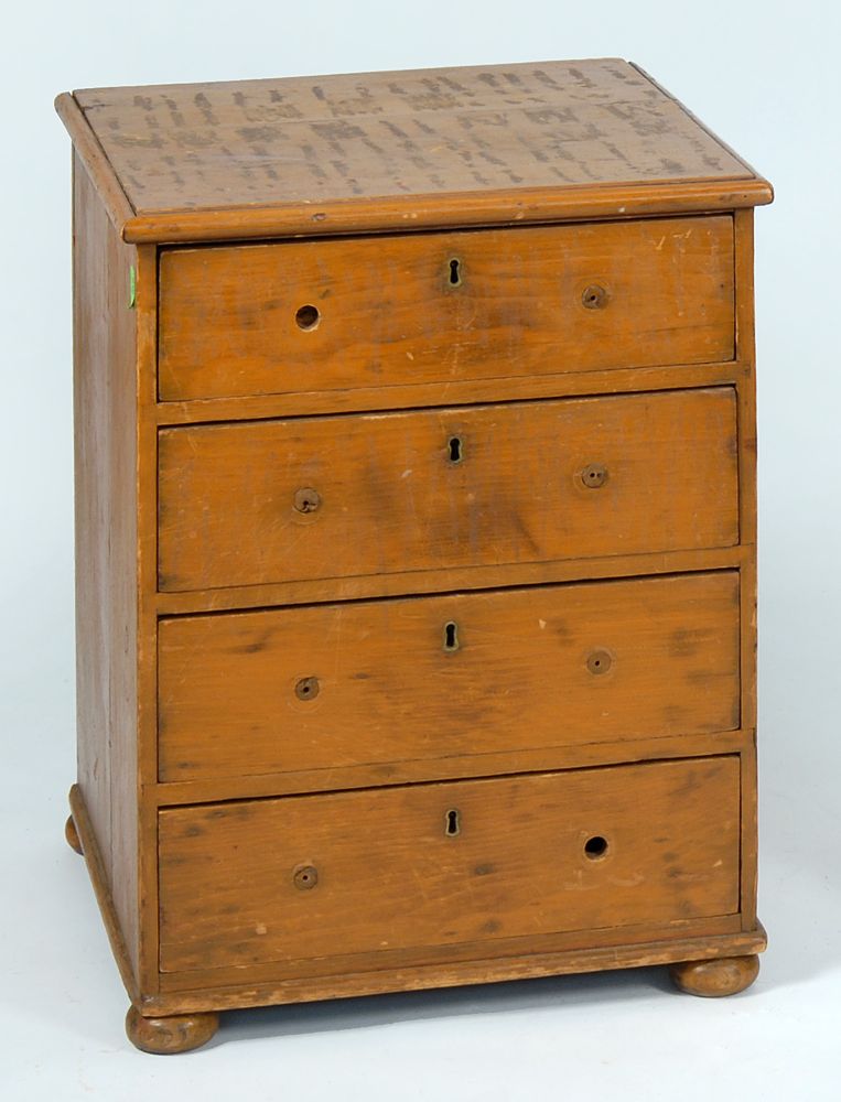 Appraisal: ANTIQUE AMERICAN FOUR-DRAWER SMALL CHEST In pine with old brown