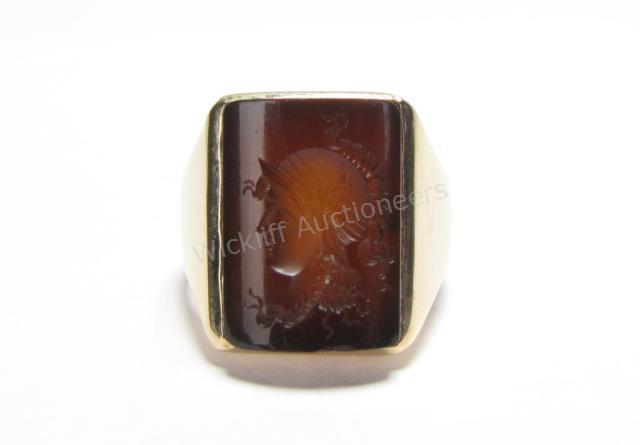 Appraisal: A K yellow gold gentleman's smoky quartz intaglio ring size