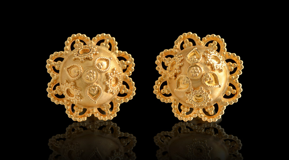 Appraisal: ETRUSCAN K GOLD DOME GRANULATED EAR STUDS Lustrous yellow gold