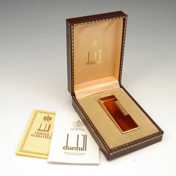 Appraisal: DUNHILL TORTOISE SHELL ROLLAGAS LIGHTER Tortoise shell lacquer case Sold