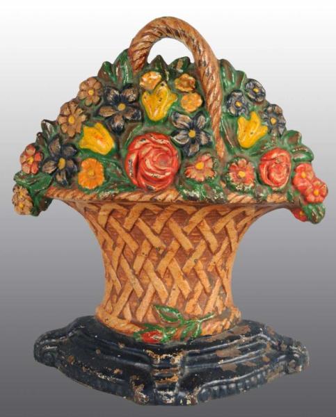 Appraisal: Cast Iron Mixed Flower Basket Doorstop Description Made by Hubley