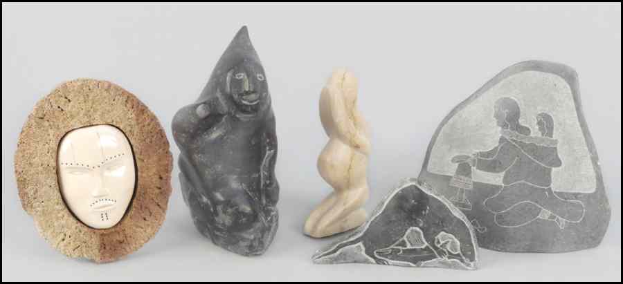 Appraisal: THREE INUIT STONE CARVINGS Together with a carved bone face