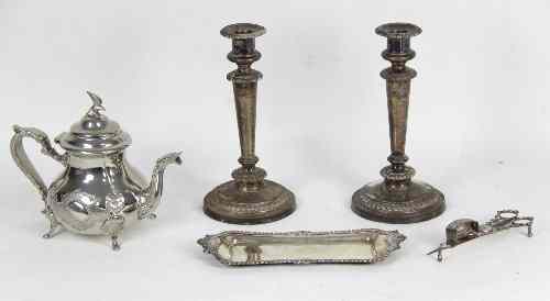 Appraisal: A pair of Sheffield plated candlesticks by Matthew Boulton a