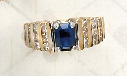 Appraisal: SAPPHIRE AND DIAMOND RING k yellow gold ring with prong