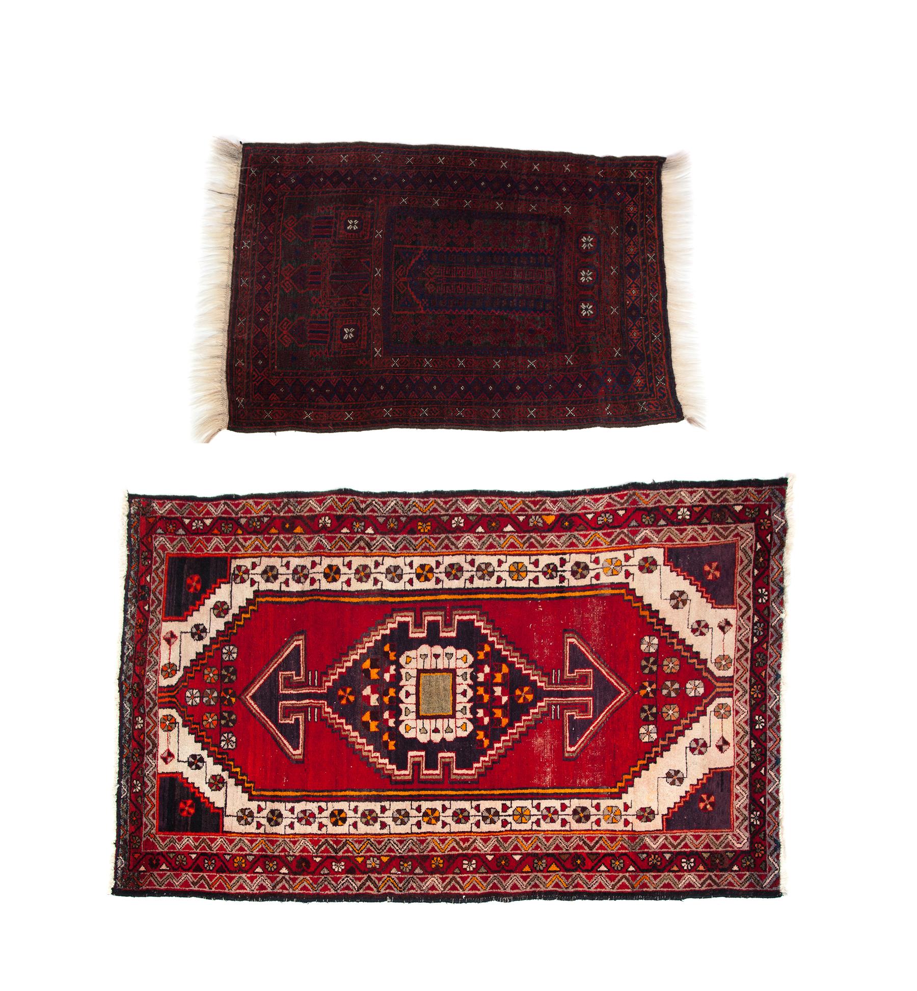 Appraisal: TWO ORIENTAL RUGS Late th century Caucasian-style with red ground