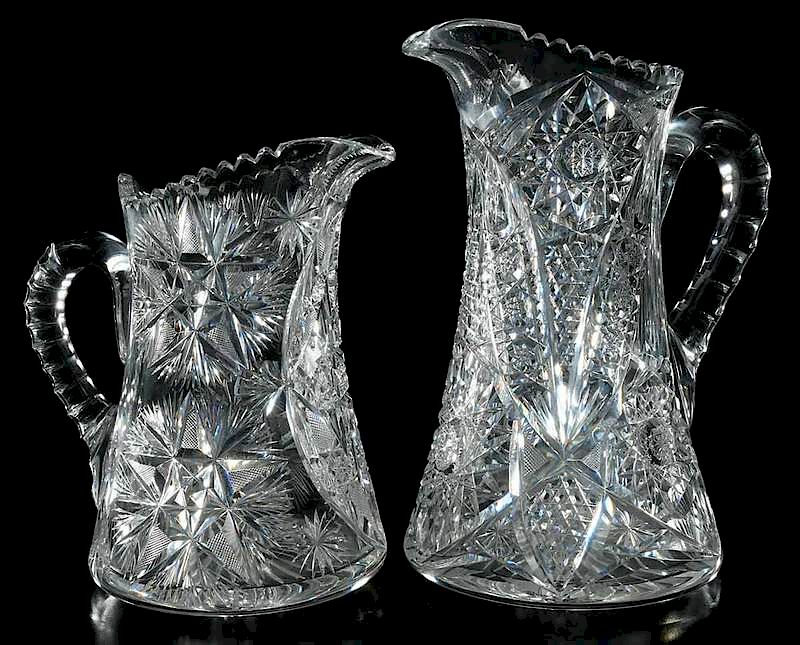 Appraisal: Two Brilliant Period Cut Glass Pitchers Rajah pattern Pitkin and