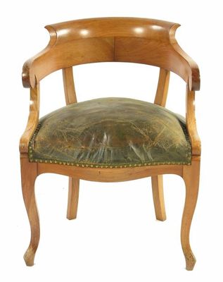 Appraisal: A late th century continental fruitwood open tub armchair with