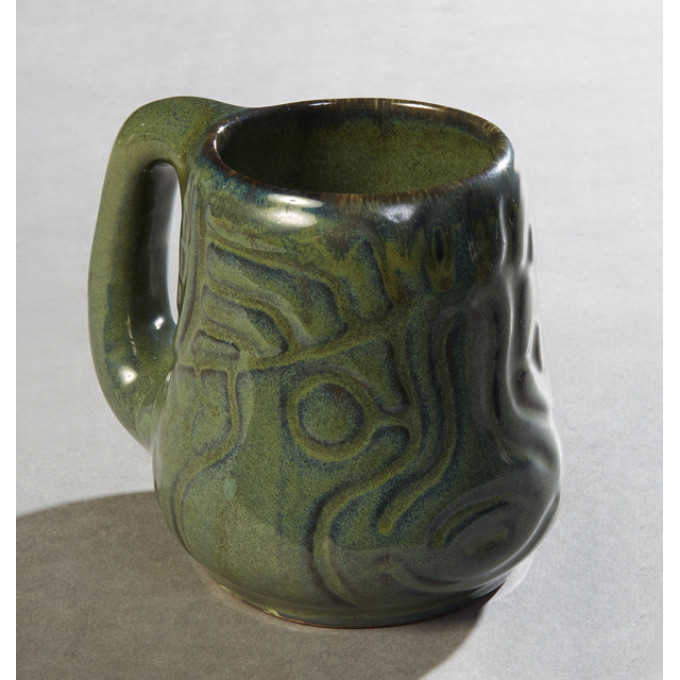 Appraisal: Shearwater Art Pottery Fish Mug st c molded by Walter