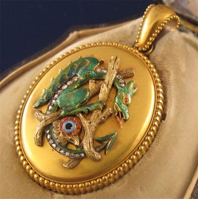 Appraisal: An unusual Victorian gold locket mounted with a dragon and