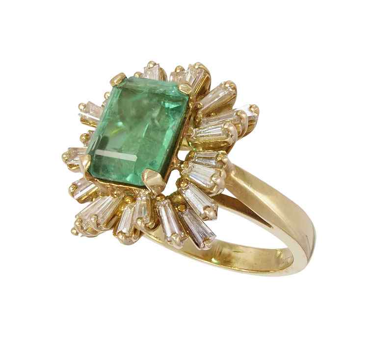 Appraisal: CT EMERALD RING WITH DIAMONDS K yellow gold ring centers