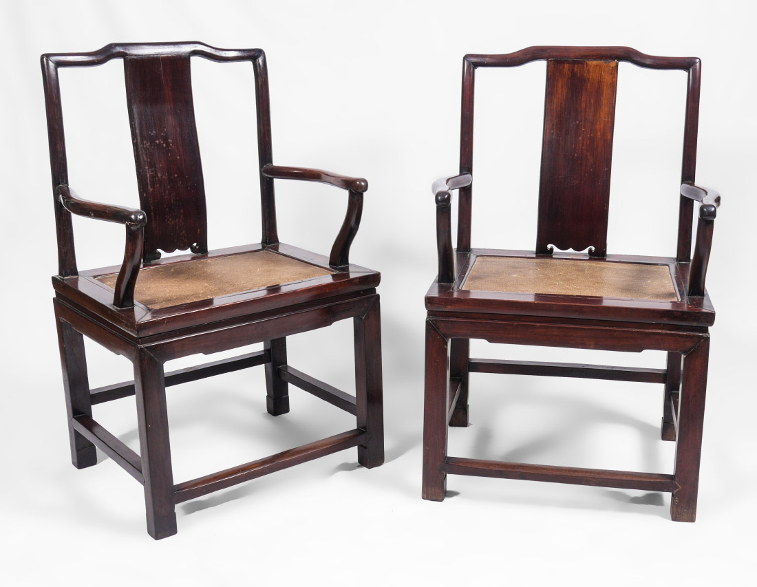 Appraisal: PAIR CHINESE ROSEWOOD ARM CHAIRS Heavy rosewood shaped crest arms