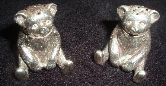 Appraisal: A pair of teddy bear pepper pots GV Co Birmingham