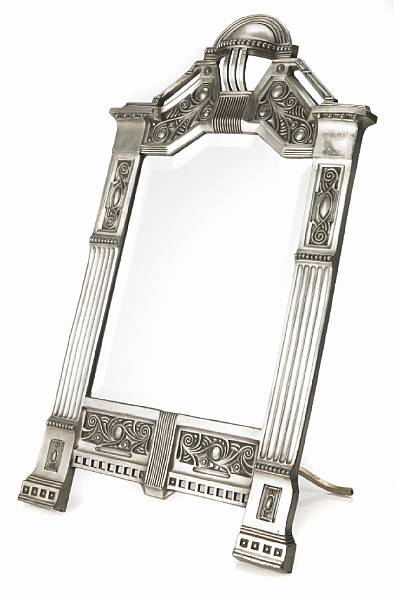 Appraisal: A German silvered-metal and beveled glass vanity mirror early th