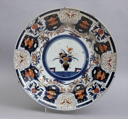 Appraisal: JAPANESE IMARI PORCELAIN BASIN The rondel with flower-filled blue vase