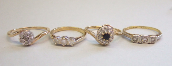 Appraisal: A gold and diamond set three stone ring a ct