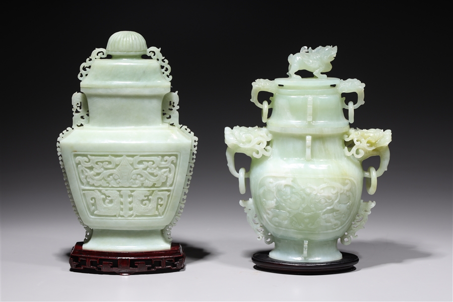 Appraisal: Two Chinese carved hardstone covered vases one with animal handles