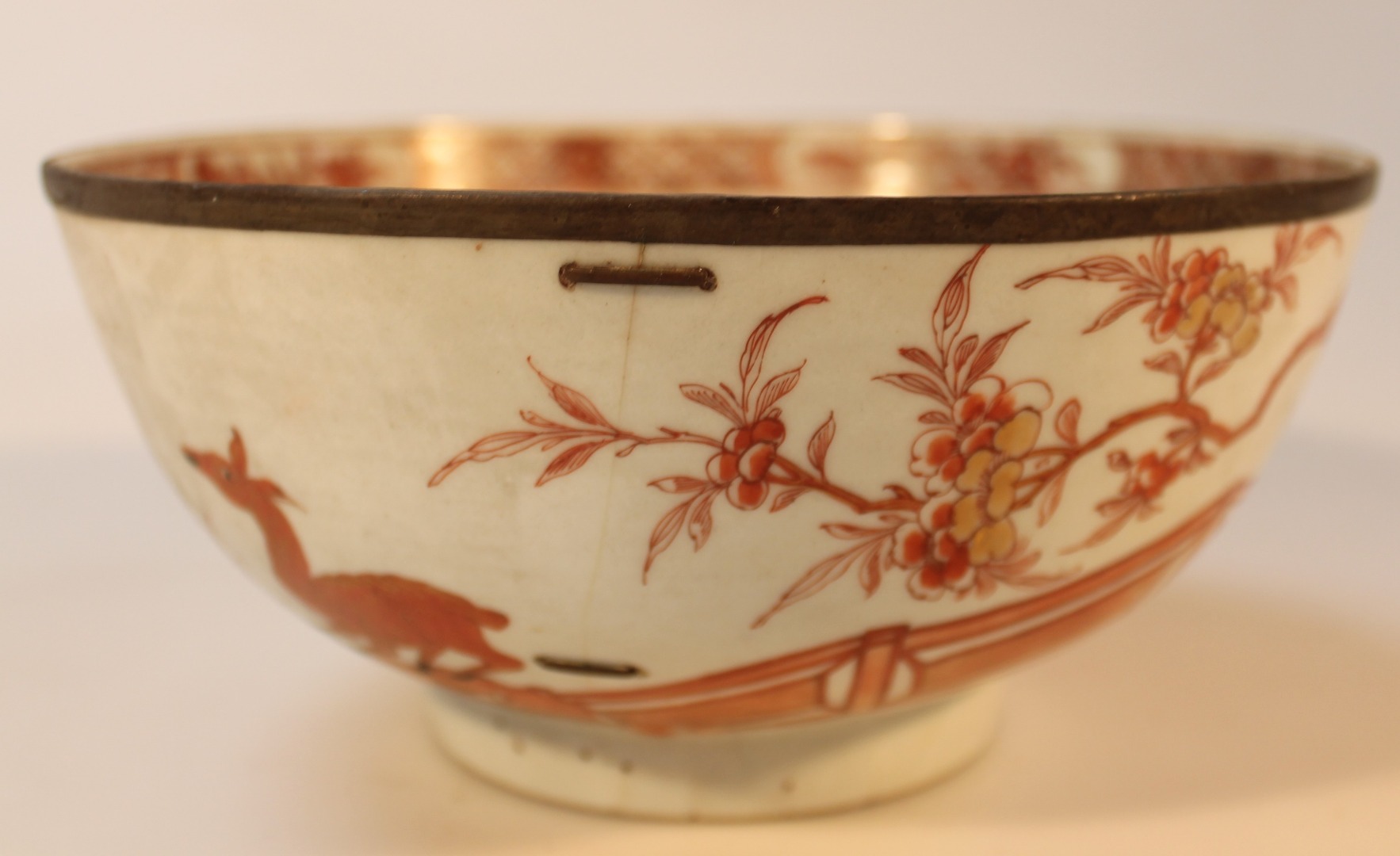 Appraisal: A Chinese porcelain bowl with an inner geometric banding broken